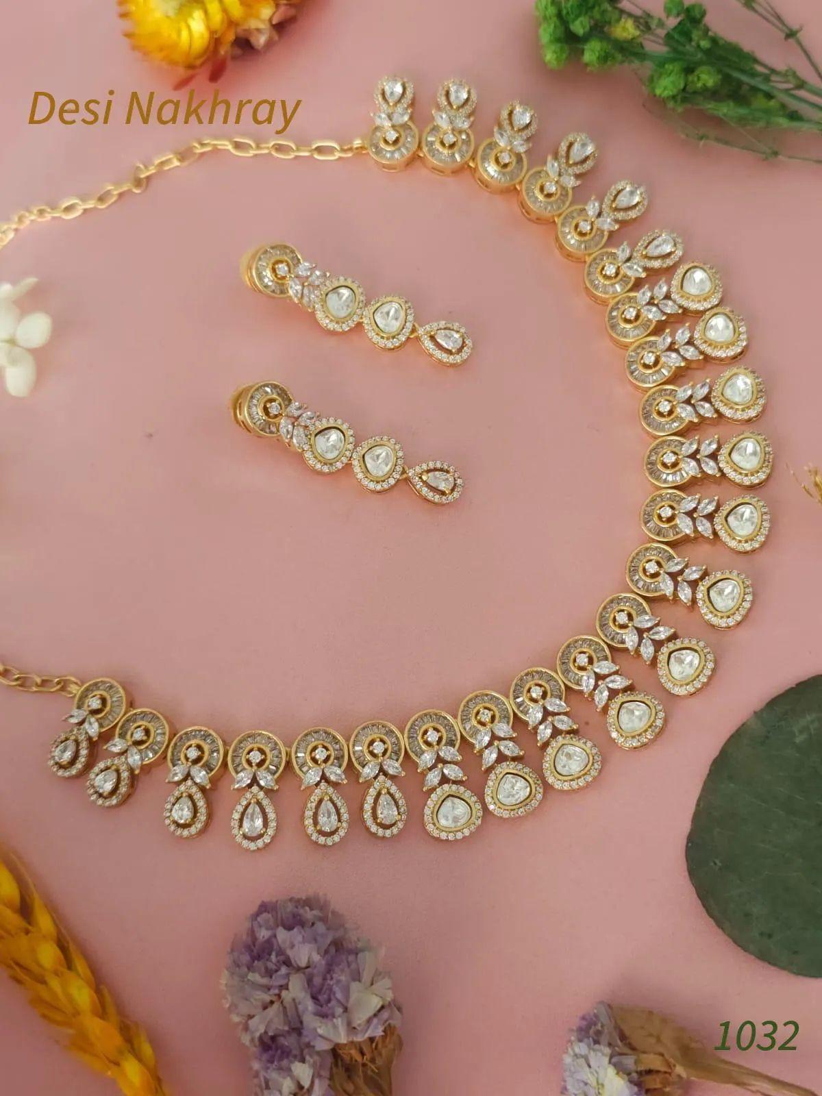 CZ Diamond, Gold plated Moissanite kundan and Baguette stone choker style necklace set with matching earrings. Indian royal wedding jewelry.