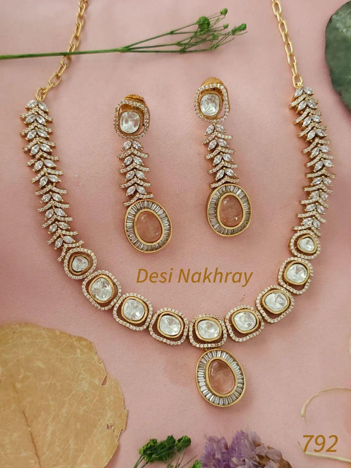 CZ Diamond, Moissanite kundan with Champagne Pink / Emerald Green Doublet & Baguette stone necklace set with matching dangling earrings.