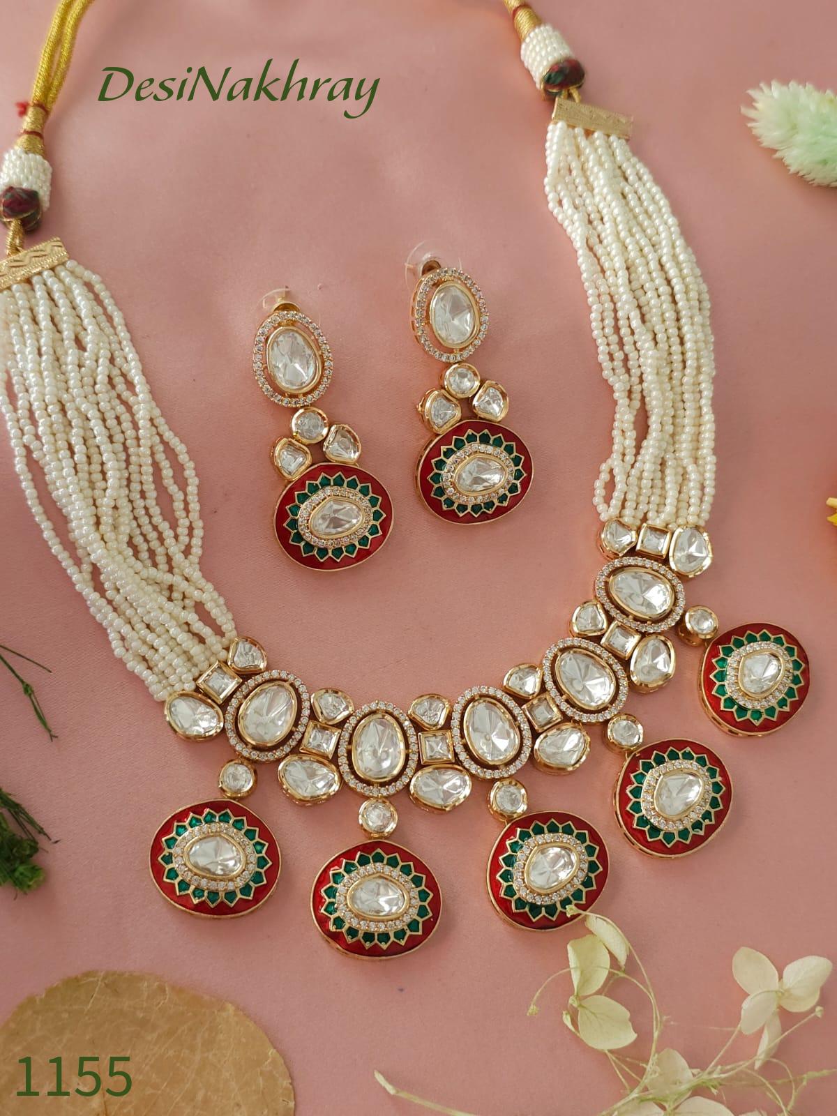 Silver foiled Kundan with intricate Meenakari Hasli necklace set. Comes with matching earrings.Royal Indian Wedding